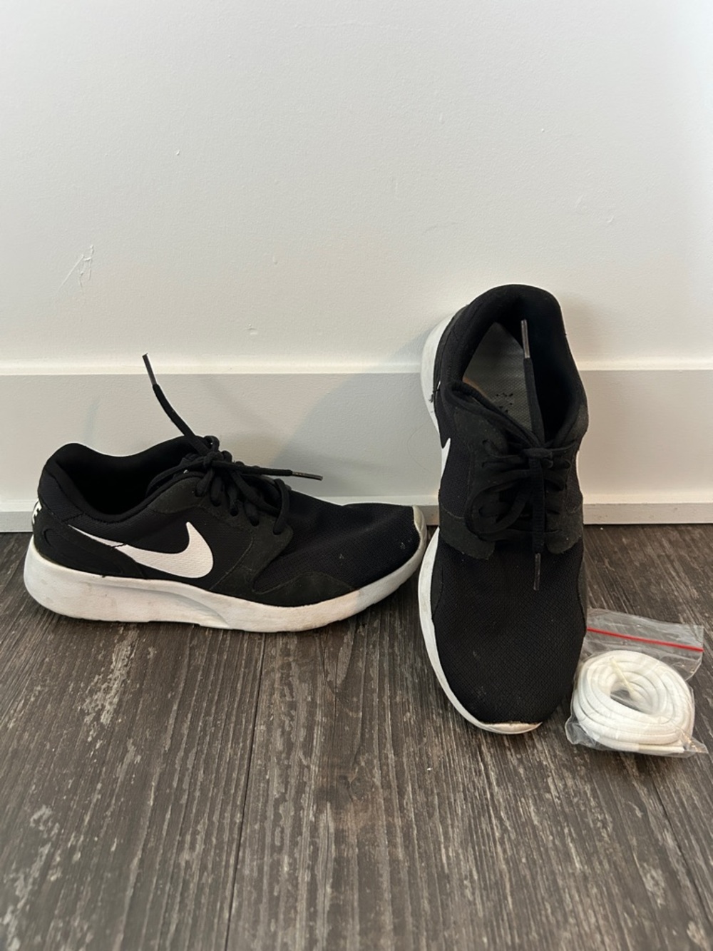 Nike Black Athletic Sneakers with White Swoosh